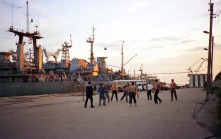Sailors relax at sunset in the formerly closed Black Sea port city, Sevastopol